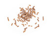 Animal feed. Sunflower granulated feed  on white background, close-up. Animal cattle food pellets. Heap of animal feed pellets  on white background.