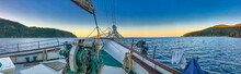 Sailing Along Beautiful Islands Scenario. Panoramic Seascape Sunset View From The Sailing Ship
