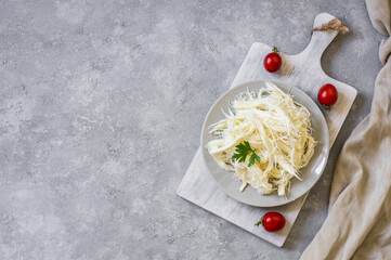 Turkish traditional homemade checil or string cheese on plate, healthy dairy product