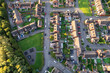 Top down aerial view of houses and streets in a residential area UK New Build Estate Agent House Prices 2022