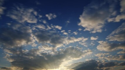 Wall Mural - clouds in the blue sky on a summer day timelapse