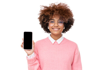 African girl in glasses holding smartphone with blank screen with copy space and showing it to viewer