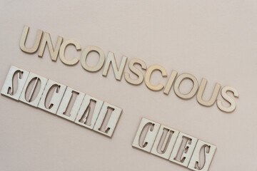 Poster - unconscious social cues - sign with wood type