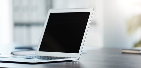 Aufkleber - Digital, laptop and black screen mock up on table surface in office building for marketing, design and frame. Desktop, monitor and online with creative mockup on empty or blank pc display on desk