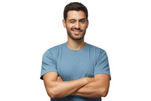 Handsome Young Man In Blue T-shirt, With Crossed Arms Smiling And Winking, Looking At Camera