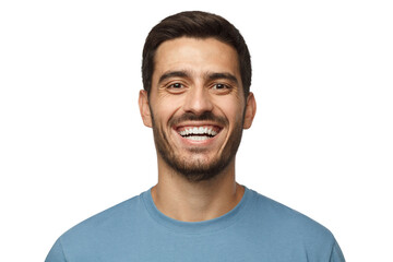 Wall Mural - Close up horizontal shot of handsome smiling broadly unshaven young man in blue tshirt laughing out loud