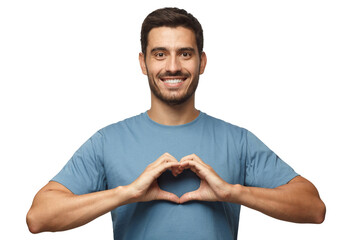 Wall Mural - portrait of young smiling man in blue t-shirt showing heart sign isolated