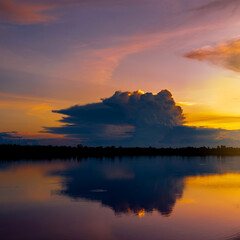 Wall Mural - square photo,beautiful clouds sunset over the sea.dramatic sky on twilight time and reflection on th