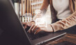 © Ton Photographer4289 - Female hands typing on laptop with chat icon. Chatting in facebook, searching working information, browsing.  Technology concept