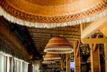 Wicker Straw Lamps, Wooden Roof. Trendy Interior Design Of A Hipster Cafe In Loft Style