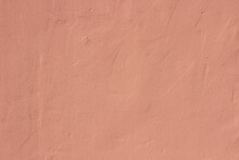Light Pink Terracotta Plaster Rough Wall Texture Background	