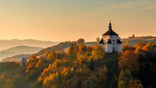The New Castle in Banska Stiavnica at sunrise in an autumn season, Slovakia, Europe.