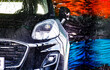 © monticellllo - A vehicle in an automatic car wash