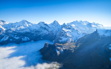 Wall Mural - mountain scenery in the swiss alps. mountains peaks. natural landscape. mountain range and clear blu