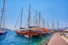 Landscape Of Wooden Touristic Ships Moored In A Blue Azure Lagoon