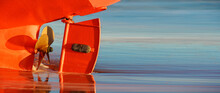 A Closeup Shot Of A Orange Boat On The Beach At Sea, Horizontal Background.