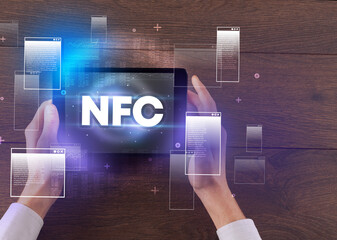 Poster - Close-up of a hand holding tablet