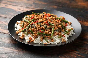 Poster - Pork Stir Fry with Green Beans, rice, garlic, chili and ginger. Asian food.