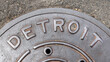 Detroit city sign on old Man hole cover