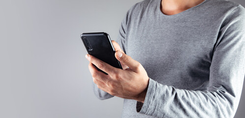 Poster - Young man holding a phone