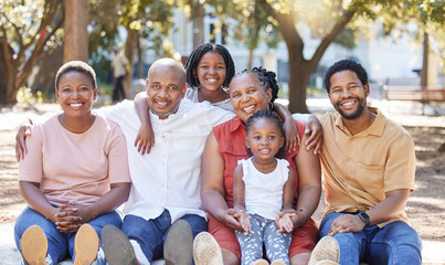 Poster - Happy portrait of a black family in nature with mother, grandparents and children smiling next to father. Mom, dad and kids love quality time with senior African woman at a park in summer on holiday