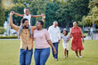 © L Ismail/peopleimages.com - Generation of happy family walking in park, garden and summer nature outdoors to relax, bonding during quality time. Black people with grandparents, parents and children in love, care and support