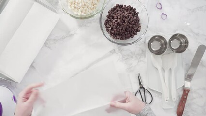 Wall Mural - Flat lay. Step by step. Ingredients to prepare chocolate dipped strawberries on a marble surface.