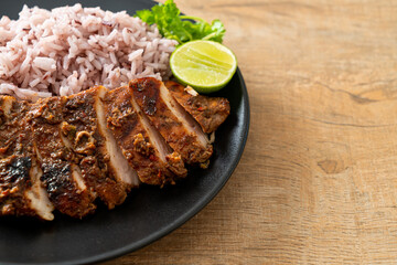 spicy grilled Jamaican jerk chicken with rice