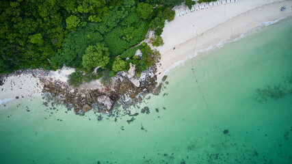  Aerial top view to the green azure sea coast