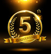 5th golden anniversary logo with ring and ribbon, laurel wreath
