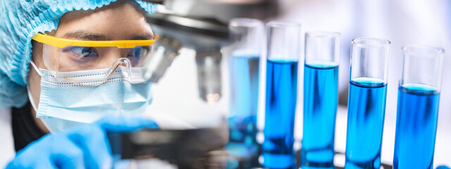 Wall Mural - banner background of scientist research in medical science laboratory, medicine technology with biol