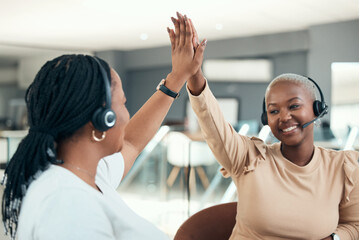 Canvas Print - High five, call center and teamwork with women celebrating and happy about success, target and goal working in telemarketing office. Black CRM, customer support and service agents in collaboration