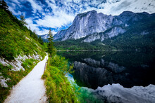 Lovely View Of Walkway Around The Alpine Altausseer See (Lake Aussee) In Ausseer Land, Styria, Austria, With The Trisselwand Peak In The Background
