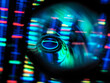 © Connect Images - Detail of test tube with illuminated genetic data in background