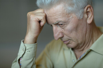 Poster - An elderly man in a state of depression.