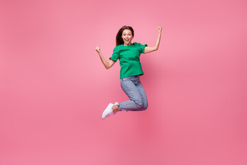 Poster - Full length photo of overjoyed energetic person jumping raise fists shout yes isolated on pink color background