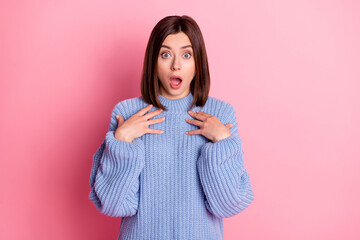 Poster - Portrait of shocked young girl hands touch chest open mouth staring isolated on pink color background