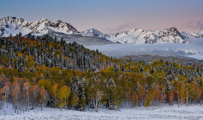 Wall Mural - Early morning autumn fog in the San Juan Mountains of Colorado.