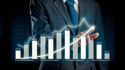 Wall Mural - Businessman draw finance allusive graph chart showing business profit growth increasing to future target . Excellent financial status of corporate business rise up . Finance and money technology .