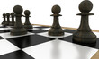 Image of black pawn chess pieces on chessboard