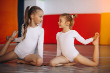 Group of girls exercising at gymnastic school