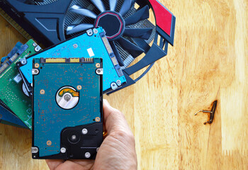 Poster - Hard disk drives are still widely used. hard drive in hand