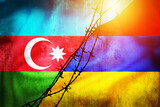 Grunge flags of Azerbaijan and Armenia divided by barb wire illustration sun haze view