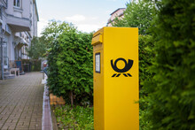 Yellow Mailbox On The Street
