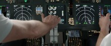 DOLLY IN Commercial Aircraft Pilots Controlling Airplane Throttle Lever During The Flight Or Take Off. View From Inside The Cabin. Real Aircraft, Daytime Shot