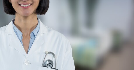 Sticker - Female doctor wearing a lab coat and working in a hospital