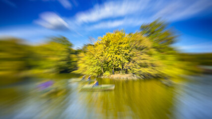 Poster - New York City - October 2015: Tourists and locals enjoy Central Park Lake in foliage season