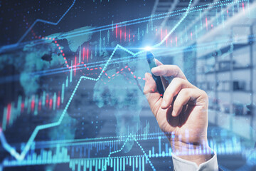Poster - Close up of man hand pointing at creative glowing forex chart on blurry office interior background. Trade, finance, stats. Double exposure.