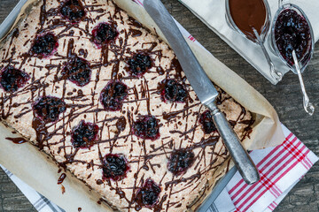 Canvas Print - Coconut and blackcurrant jam macaroon traybake with chocolate drizzle