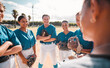 © Lumeez I/peopleimages.com - Team of women baseball players, given strategy and motivation by coach to win game. Winning in sport means leadership, teamwork and pride as well as healthy competition for group victory in softball